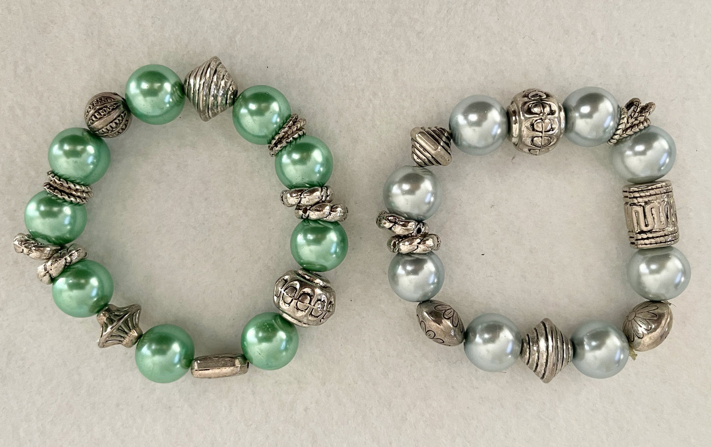 Set of 2 Bracelets for girls, teenagers, young ladies! Round beads with silver shapes on elasticated band makes a beautiful gift