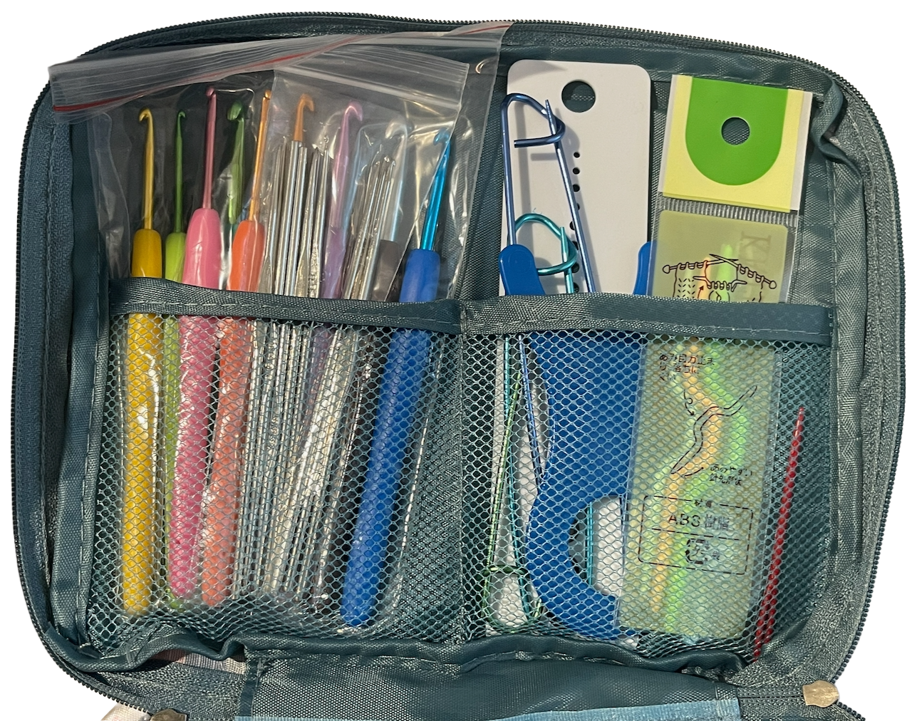 Organized crochet hook set in a clear pouch with various colors and sizes.