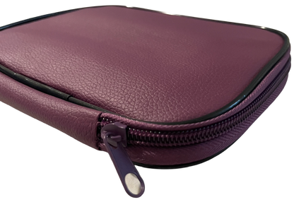 Purple faux leather case with a zipper on a white background
