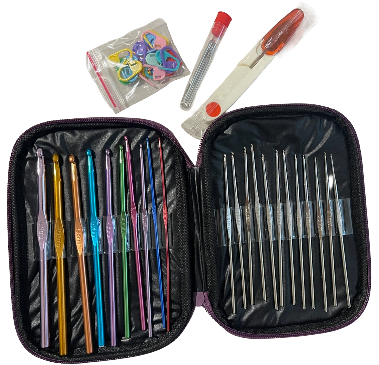 Set of crochet hooks and needles in a case with accessories on a white background