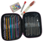 Set of crochet hooks and needles in a case with accessories on a white background