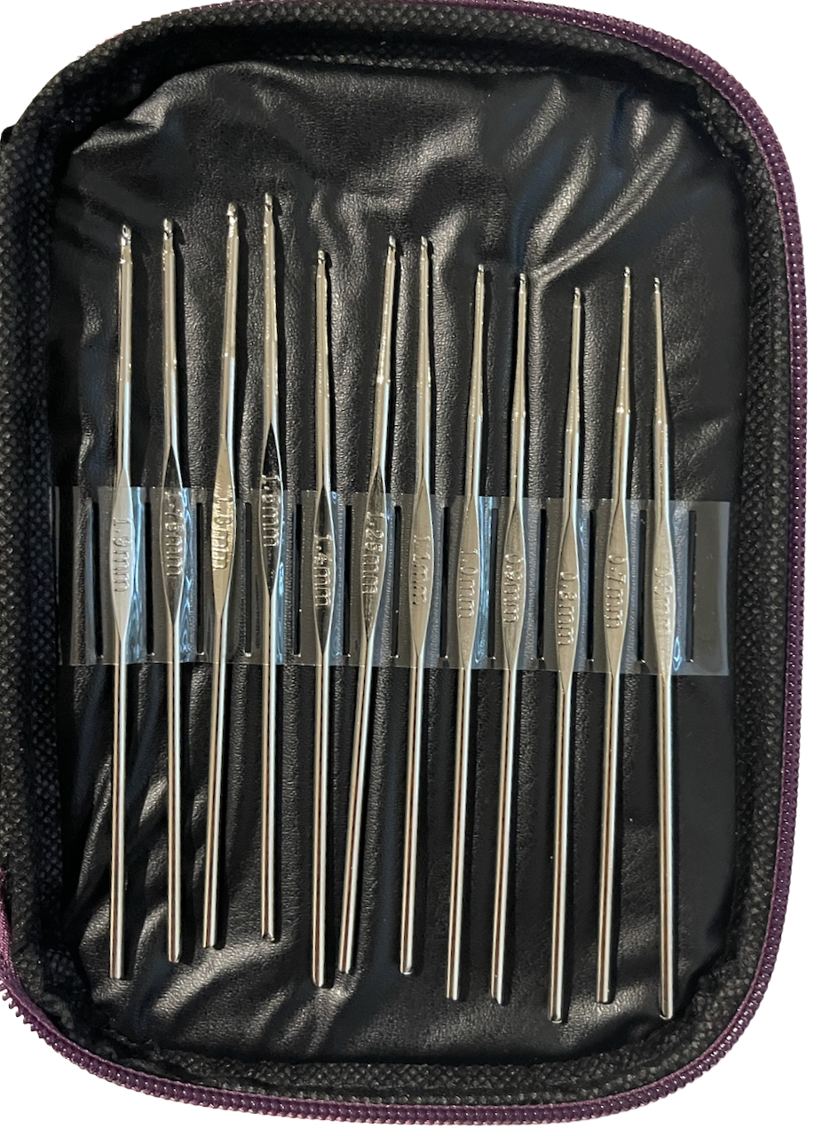 Set of metal crochet hook needles in a Purple case