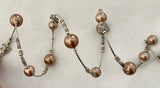 Bracelets Pearls on Silver Wire with Butterflies, fits all wrist sizes, wrap around. Loved by Teenagers and ladies alike