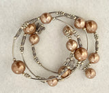 Bracelets Pearls on Silver Wire with Butterflies, fits all wrist sizes, wrap around. Loved by Teenagers and ladies alike