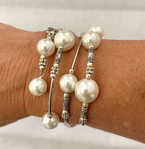 Bracelets Pearls on Silver Wire with Butterflies, fits all wrist sizes, wrap around. Loved by Teenagers and ladies alike