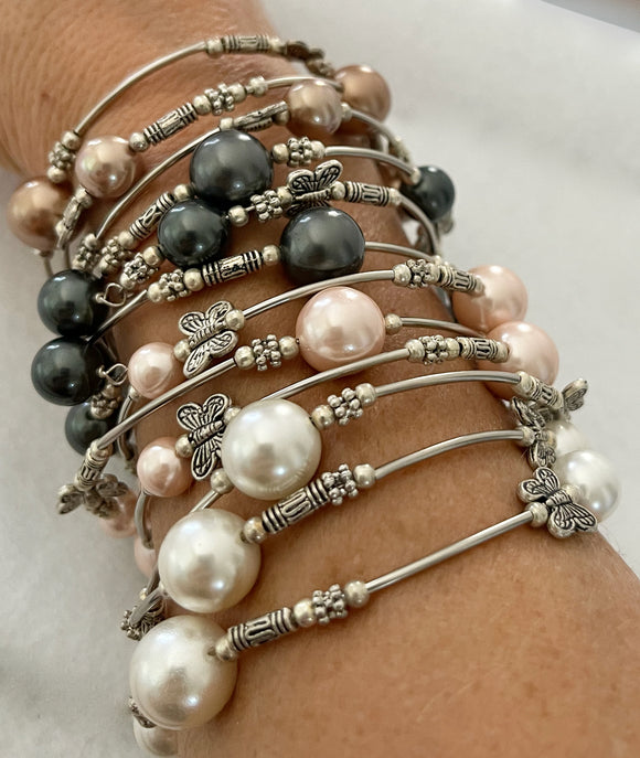 Bracelets Pearls on Silver Wire with Butterflies, fits all wrist sizes, wrap around. Loved by Teenagers and ladies alike