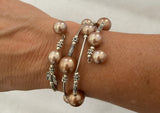 Bracelets Pearls on Silver Wire with Butterflies, fits all wrist sizes, wrap around. Loved by Teenagers and ladies alike